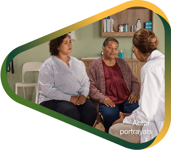 Actor portrayal of a caregiver and her loved one at the doctor's office discussing their treatment journey with agitation that may happen with dementia due to Alzheimer's disease.