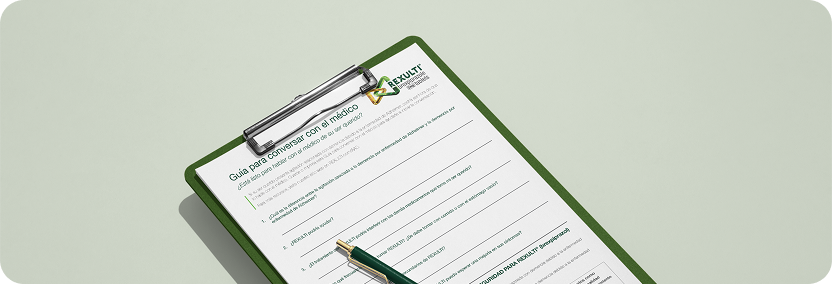 Guía de conversación con el médico en un portapapeles con bolígrafo