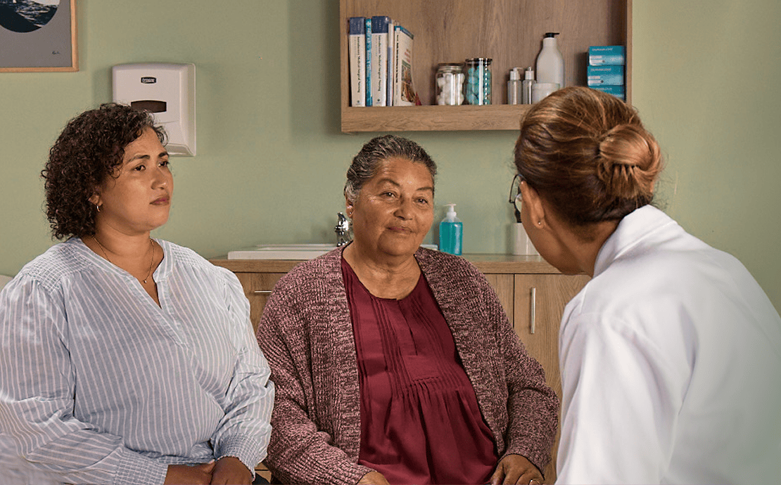 Actor portrayal of a caregiver and her loved one at the doctor's office discussing their treatment journey with agitation that may happen with dementia due to Alzheimer's disease.
