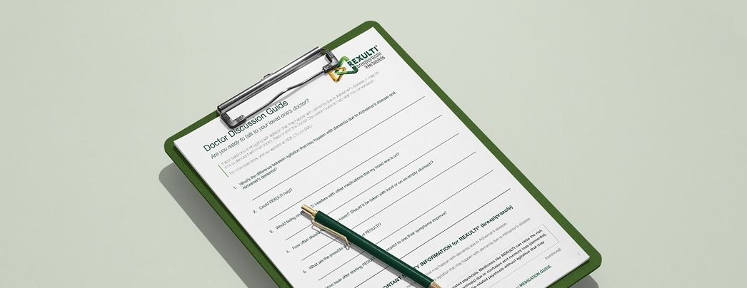 Doctor Discussion Guide on a clipboard with a pen on top